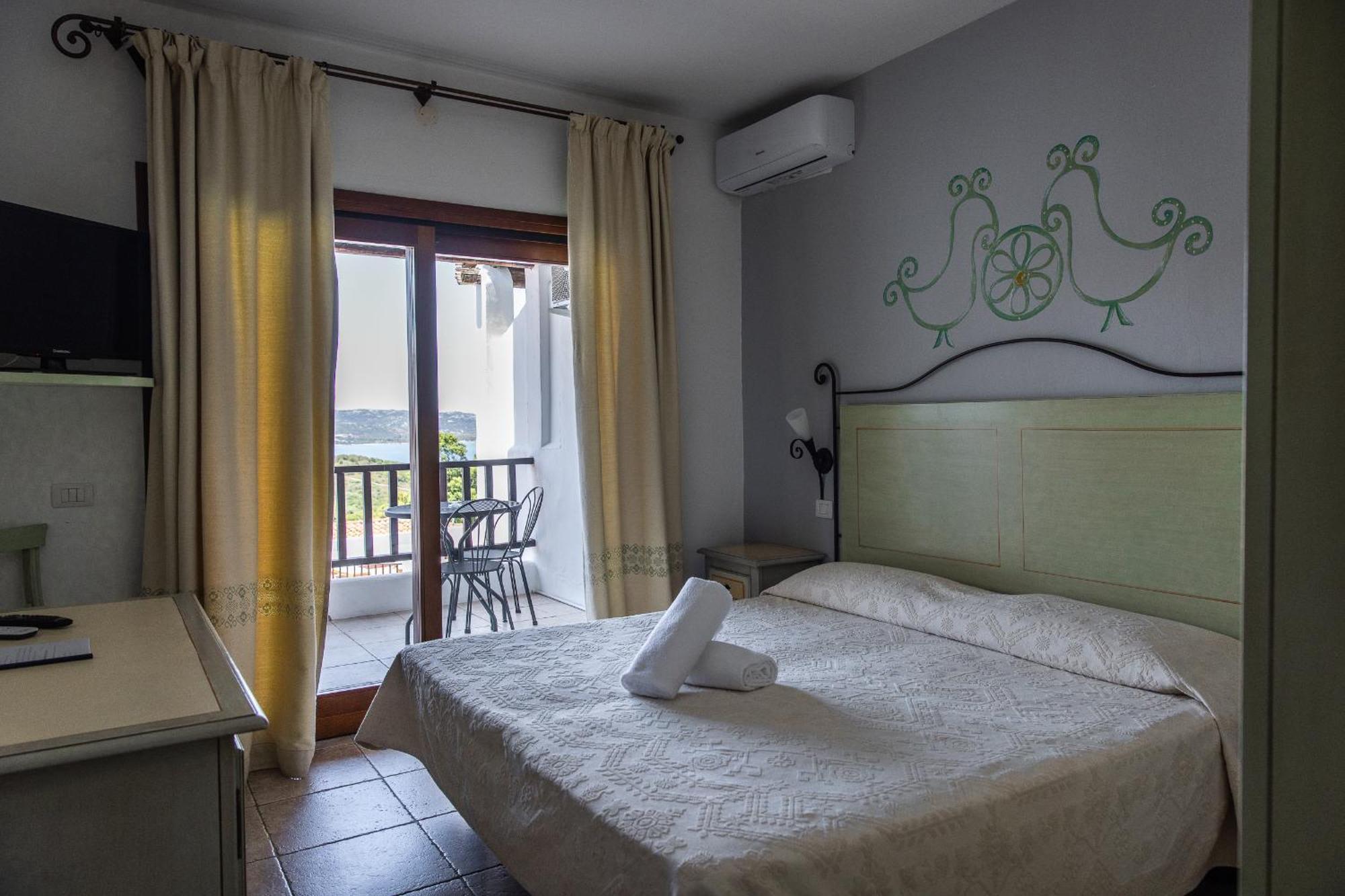 Hotel Pedra Santa Baja Sardinia Exteriör bild
